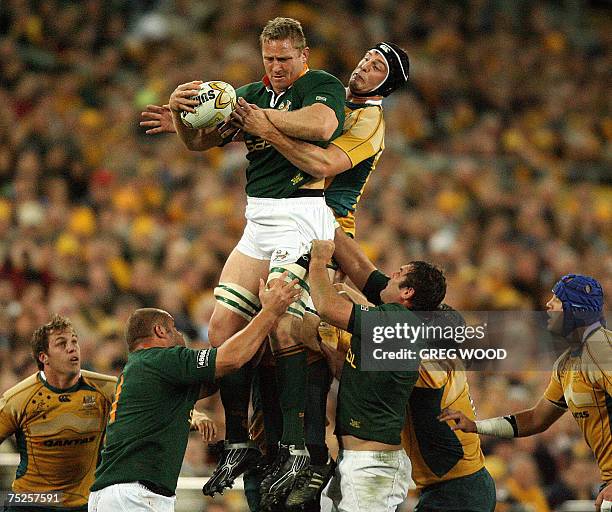 Johan Ackermann of South Africa takes the ball during a line-out in the Tri-Nations rugby union Test against Australia in Sydney, 07 July 2007. South...
