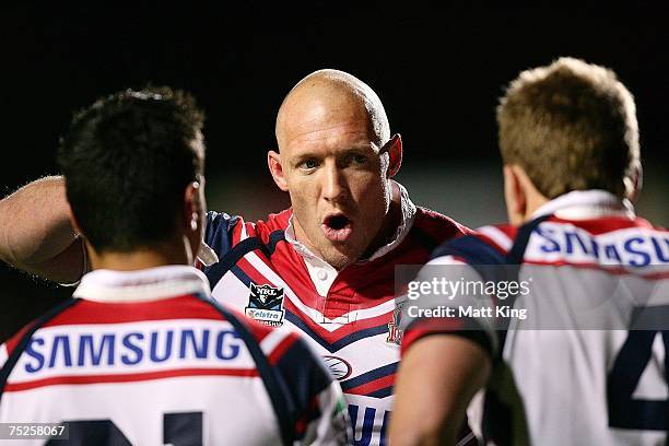 Roosters captain Craig Fitzgibbon talks to his team mates after a Sea Eagles try during the round 17 NRL match between the Manly Warringah Sea Eagles...