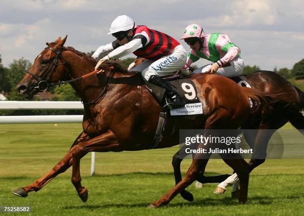 Jamie Spencer and Hoh Mike land The Laurent-Perrier Champagne Sprint Stakes Race run at Sandown Racecourse on July 7 in Sandown, England.