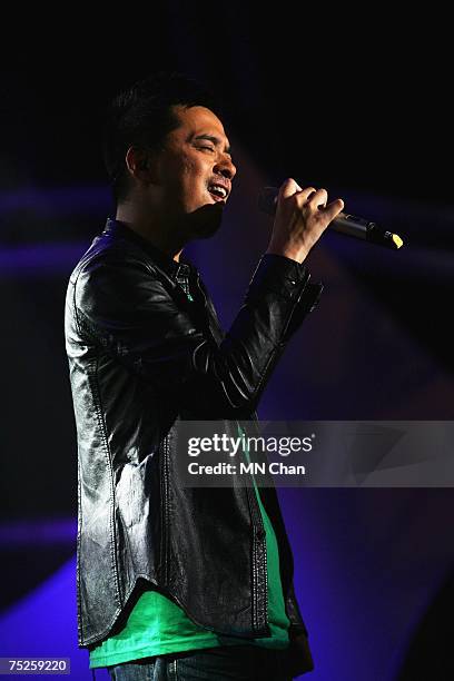 Hong Kong singer Anthony Wong performs on stage at the China leg of the Live Earth series of concerts at the Oriental Pearl Tower on July 7, 2007 in...