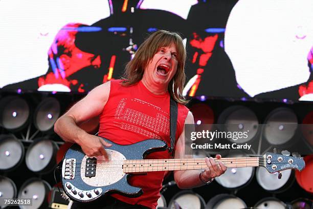 Christopher Guest of spoof American heavy metal band Spinal Tap performs on stage during the Live Earth concert held at Wembley Stadium on July 7,...