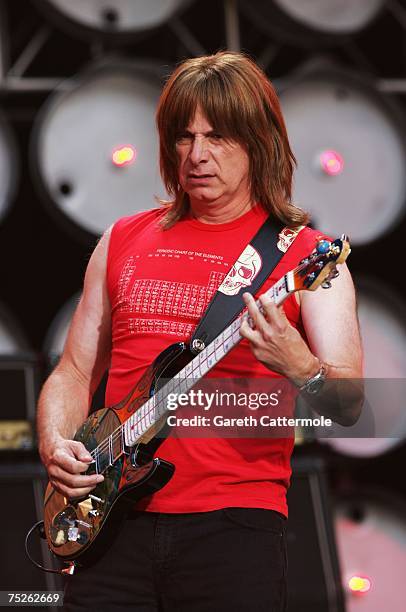 Christopher Guest of spoof American heavy metal band Spinal Tap performs on stage during the Live Earth concert held at Wembley Stadium on July 7,...