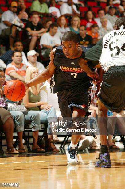 Kelenna Azubuike of the Golden State Warriors drives to the hoop against the New Orleans Hornets during Game 1 of the NBA Summer League at the Cox...