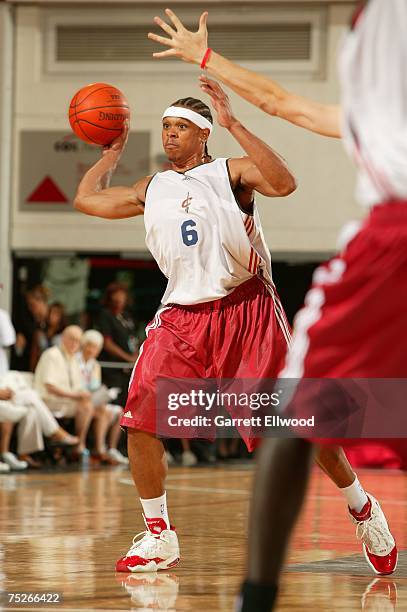 Shannon Brown of the Cleveland Cavaliers passes the ball against the San Antonio Spurs during Game 3 of the NBA Summer League at the Cox Pavilion...