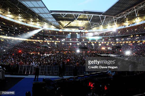 The crowd are seem from the stage during the Live Earth concert at Wembley Stadium on July 7, 2007 in London, England. Live Earth is a 24-hour,...