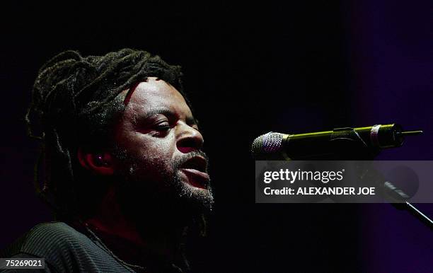 Johannesburg, SOUTH AFRICA: Astro from British group UB40 performs during the Live Earth concert in Johannesburg, 07 July 2007. The South African...