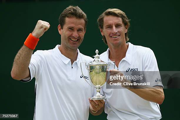 Jacco Eltingh of the Netherlands and Paul Haarhuis of the Netherlands pose with the winners trophy following the Men's Invitation Doubles Final match...