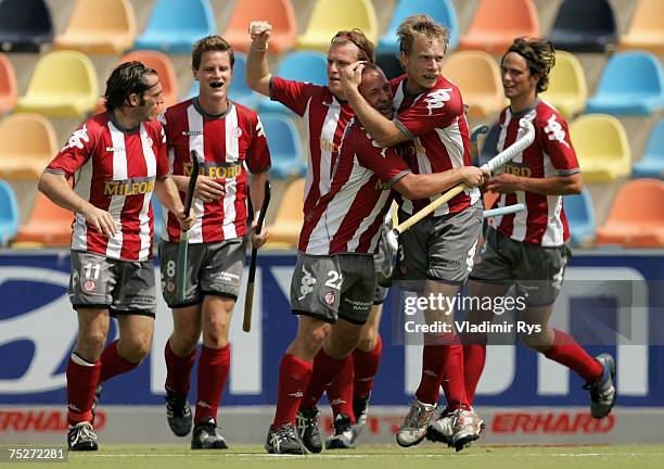 Tobias Hentschel of Alster is celebrated by his team mates after scoring the first goal during German Field Hockey Championship men?s final at the...