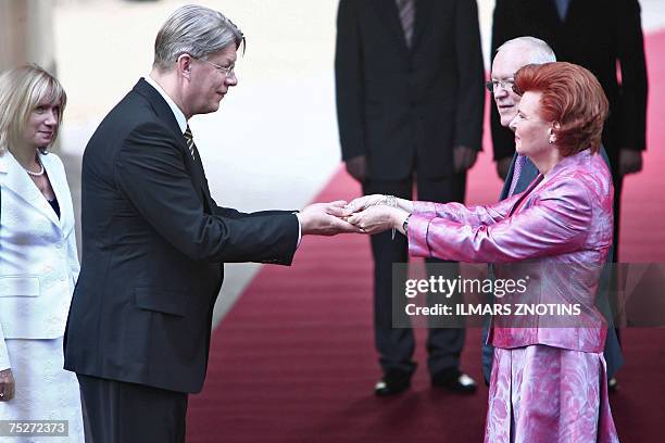 First lady Lilita Zatlere, Latvia's new President Valdis Zatlers, outgoing Latvia's President Vaira Vike-Freiberga and former First gentleman Imants...