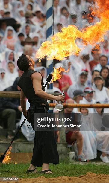 Fire-eater performs during the traditional Kaltenberg knight tournament on July 8, 2007 in Kaltenberg, Germany. With around 120,000 visitors each...