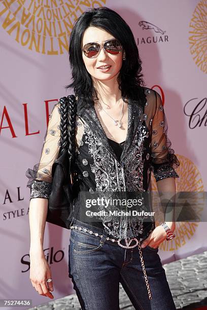 Maggie Cheung attends the Valentino - Fall/Winter Haute Couture Fashion Show at the Santo Spirito in Sassia complex on July 7, 2007 in Rome, Italy....