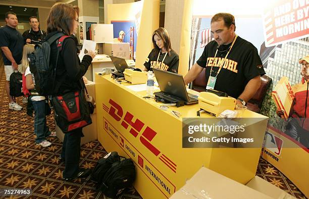 Customers send packages from their hotel using DHL Express at the Hilton San Francisco at fetivities for the 2007 Major League Baseball All-Star game...