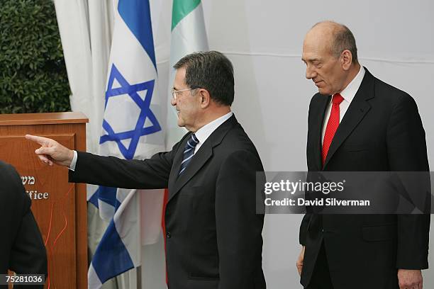 Italian Prime Minister Romano Prodi points to his podium during an official welcoming ceremony with his Israeli counterpart and host Ehud Olmert at...