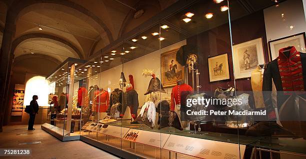 Visitor to the Household Cavalry Museum looks at the displays on July 9, 2007 in London. The museum has a unique collection of ceremonial uniforms,...