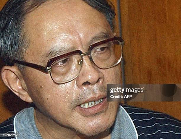 China's deputy ambassador to Pakistan, Mao Siwei talks with media representatives in Peshawar, 09 July 2007, after unidentified gunmen killed three...