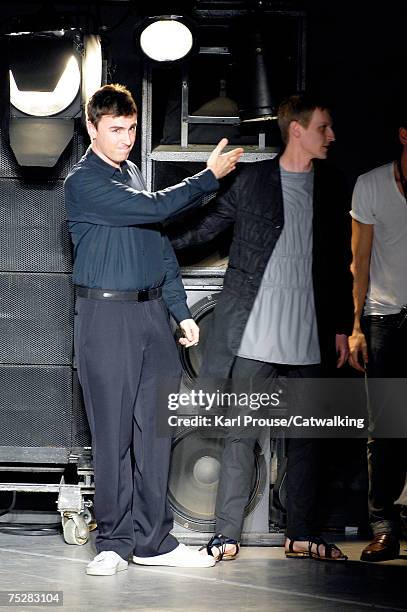 Designer Raf Simons walks the catwalk during the Raf Simons fashion show as part of Spring Summer 2008 Paris Menswear fashion week on June 30, 2007...