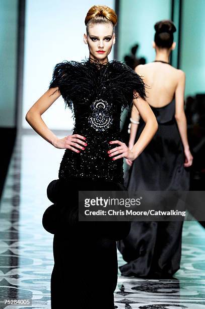 Model walks the catwalk during the Valentino 45th Anniversary Fall/Winter Haute Couture Fashion Show at the Santo Spirito in Sassia complex on July...