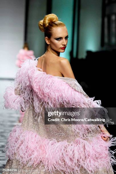 Model walks the catwalk during the Valentino 45th Anniversary Fall/Winter Haute Couture Fashion Show at the Santo Spirito in Sassia complex on July...