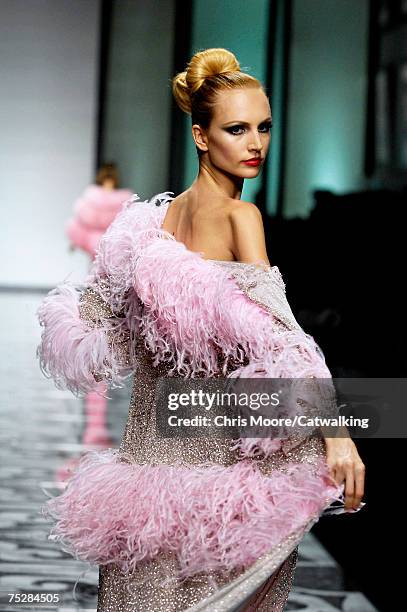 Model walks the catwalk during the Valentino 45th Anniversary Fall/Winter Haute Couture Fashion Show at the Santo Spirito in Sassia complex on July...