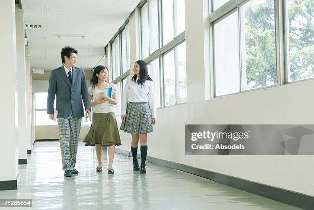 students talking to a teacher - japanese girls hot fotografías e imágenes de stock