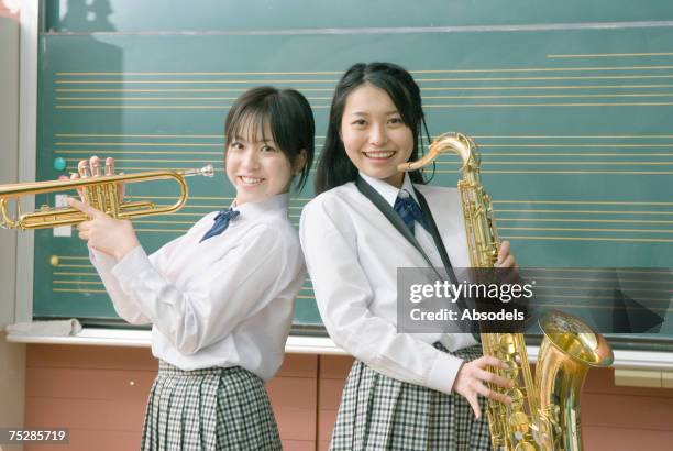 students with trumpets - blaasinstrument stockfoto's en -beelden