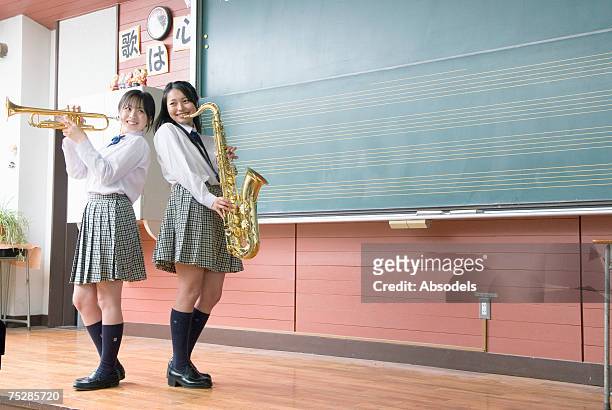 students with trumpets - 若い カワイイ 女の子 日本人 ストックフォトと画像