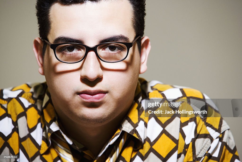 Young man wearing glasses, portrait