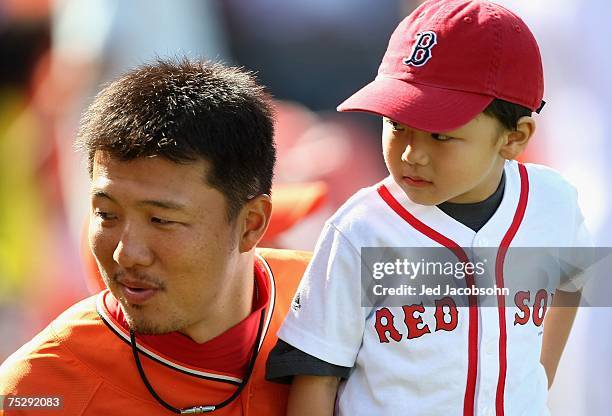 American League All-Star Hideki Okajima of the Boston Red Sox and his son attend the 78th Major League Baseball All-Star Home Run Derby at AT&T Park...