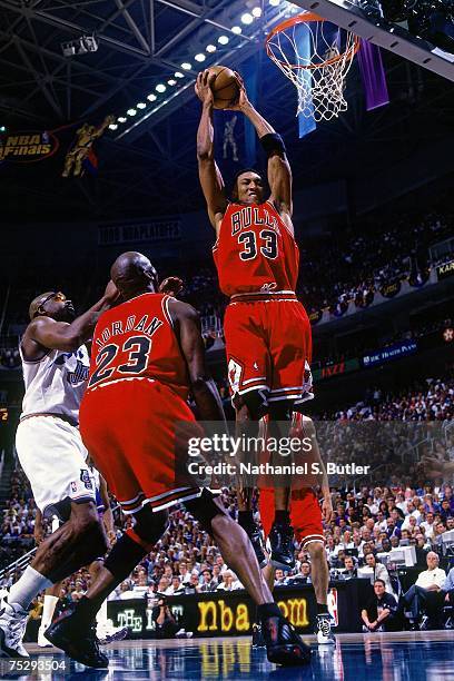 Scottie Pippen of the Chicago Bulls grabs a rebound against the Utah Jazz in Game Six of the 1998 NBA Finals against the Chicago Bulls at the Delta...