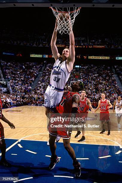 Adam Keefe of the Utah Jazz attempts a dunk against Dennis Rodman of the Chicago Bulls in Game Six of the 1998 NBA Finals against the Chicago Bulls...