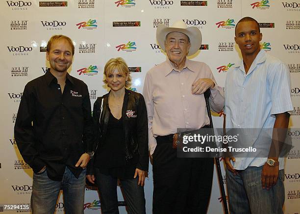 Professional Poker Players Chris Ferguson, Jennifer Harman, Doyle Brunson and Phil Ivy arrive at the Ante up for Africa poker tournement during the...