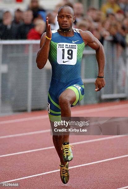 Asafa Powell of Jamaica wins 100-meter heat in 9.93 in the Prefontaine Classic at the University of Oregon's Hayward Field in Eugene, Ore. On Sunday,...