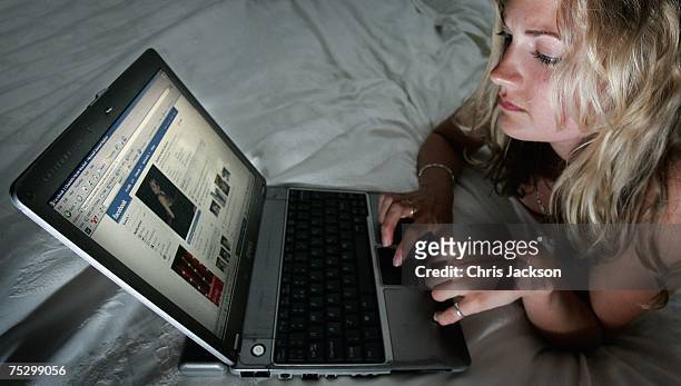 In this photo illustration a girl browses the social networking site Facebook on July 10, 2007 in London, England. Facebook has been rapidly catching...