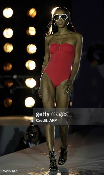 Super model Naomi Campbell presents a swimsuit during a fashion show of the GQ Style Night 09 July 2007 in Munich, southern Germany. The GQ Style...