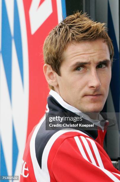 Miroslav Klose of Bayern Munich looks on when he he walk into the bus before the training session at the training campon July 10, 2007 in...