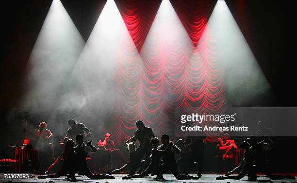 Dancers of the Tanguera tango musical perform on stage during a photo rehearsal at the Deutsche Staatsoper on July 10, 2007 in Berlin, Germany.