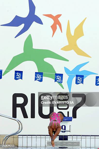 Rio de Janeiro, BRAZIL: Venezuela's swimmer Yanel Pinto dives in during a training at Maria Lenk National Aquatic Center before the start of Rio 2007...