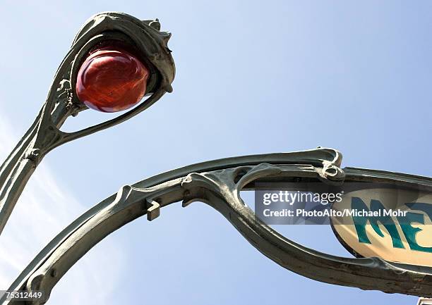 metro entrance, low angle view - subway paris stockfoto's en -beelden