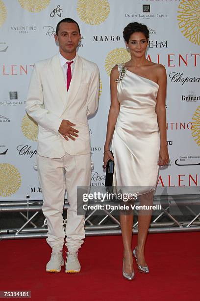 Dan Mac Millan and Astrid Munoz arrive at the Ara Pacis for Valentino's Exhibition opening on July 6, 2007 in Rome, Italy.