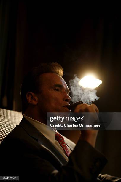 Governor Arnold Schwarzenegger, Los Angeles Mayor Villaraigosa and LA police chief William Bratton meet to smoke cigars in the "tent"at his offices...