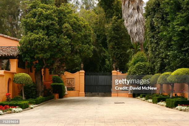 The gated entrance is closed to the Beverly House mansion of William Randolph Hearst and Marion Davies after the residence was put on the market this...