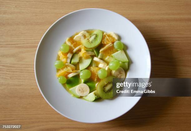 fruit salad - emma gibbs stock pictures, royalty-free photos & images