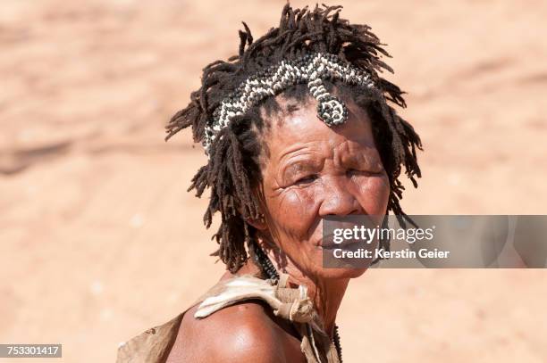 portrait or old san (bushman) woman. grashoek, bushmanland , namibia - kalahari desert stock pictures, royalty-free photos & images