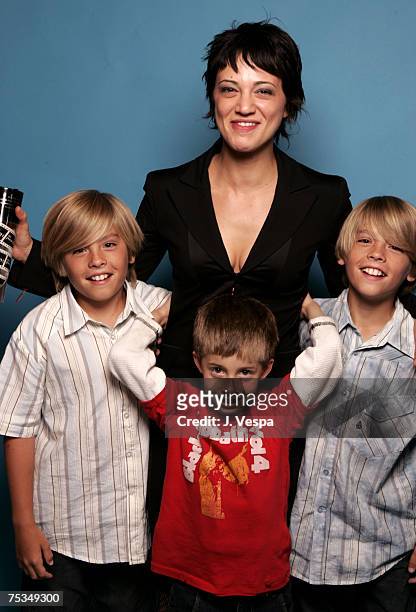 Asia Argento winner of the Hottest new Filmmaker award with presenters Jimmy Bennett and Dylan and Cole Sprouse