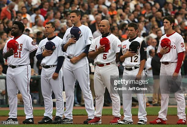 National League All-Stars stand attended during the singing of the National Anthem prior to the 78th Major League Baseball All-Star Game at AT&T Park...