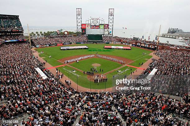 Players stand attended during the National Anthem before the 78th Major League Baseball All-Star Game at AT&T Park on July 10, 2007 in San Francisco,...