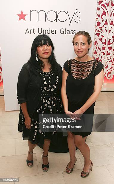 Designer Anna Sui and host Amy Larocca of New York Magazine attend a cocktail party celebrating Macy's sidewalk gallery exhibit opening of "Art Under...