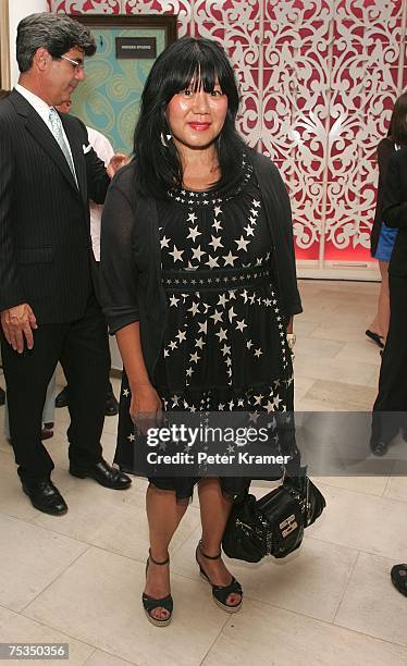 Designer Anna Sui and host Amy Larocca of New York Magazine attend a cocktail party celebrating Macy's sidewalk gallery exhibit opening of "Art Under...