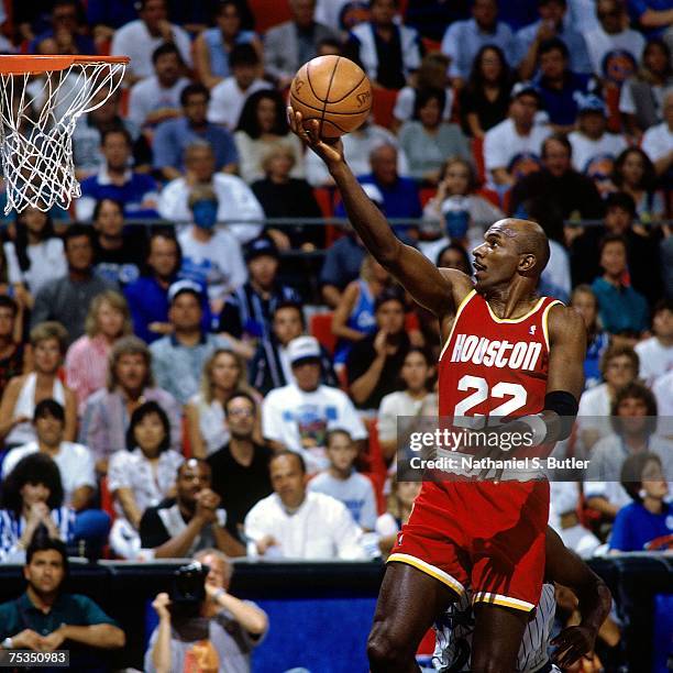 Clyde Drexler of the Houston Rockets attempts a layup against the Orlando Magic in Game Two of the 1995 NBA Finals at the Orlando Arena on June 9,...