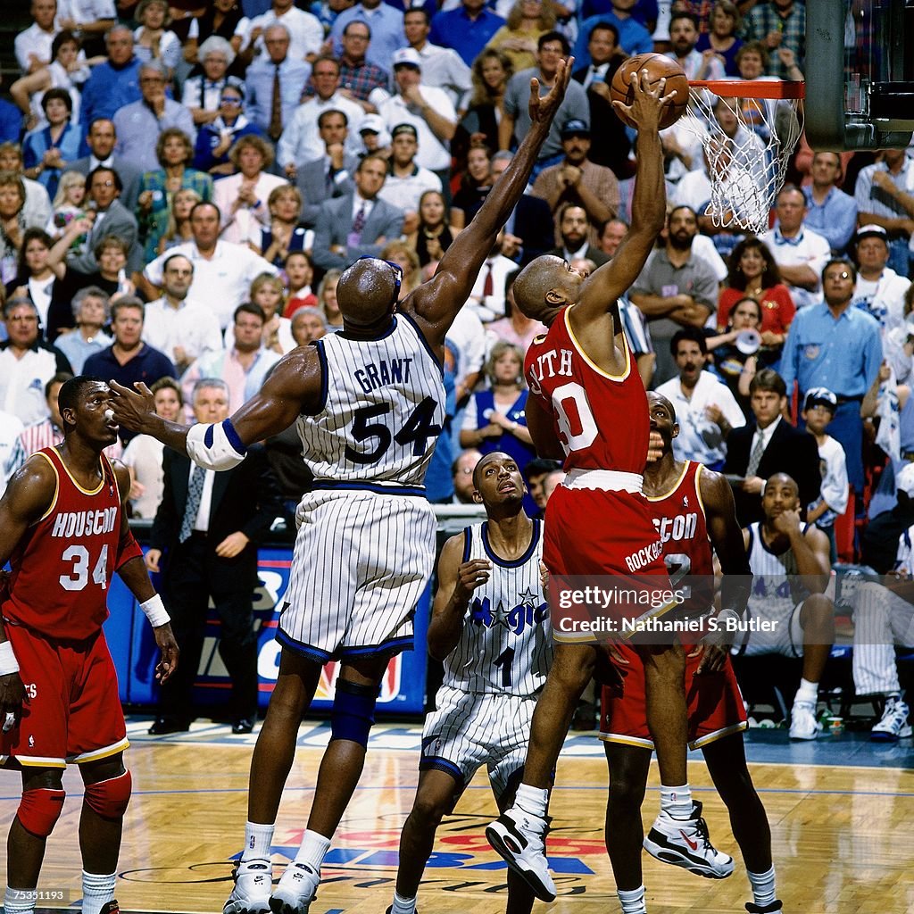 1995 Rockets Final Kenny Smith of the Houston Rockets attempts a dunk against Horace ...